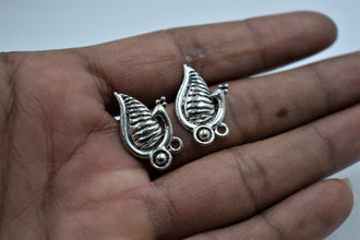 Studs for earrings in alloy 100 gram