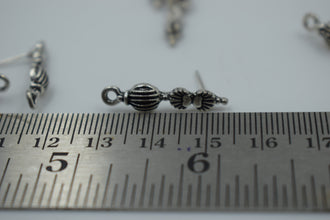 Studs for earrings in alloy 100 gram